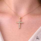 Cruz unisex en oro 10K con circonia