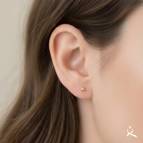 Broquel Bola lisa en oro 10K