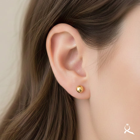 Broquel Bola lisa en oro 10K